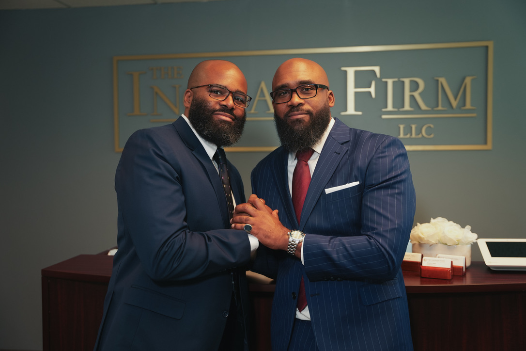 Damani K. Ingram and a member of the legal team at The Ingram Firm, L.L.C.