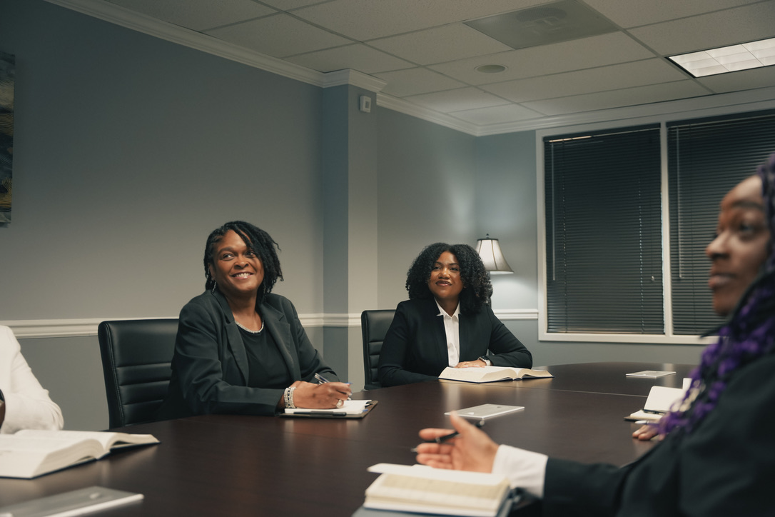 Candid photo of members of the legal team at The Ingram Firm, L.L.C.